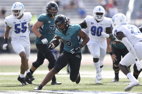 No. 17 Coastal Carolina looks stay perfect against UMass | AP News