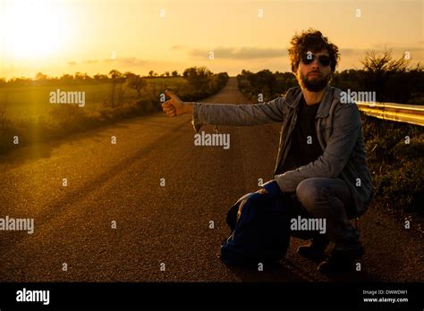 Hitchhiking hi-res stock photography and images - Alamy