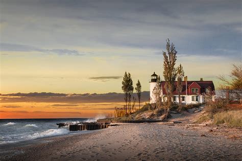 Point Betsie Lighthouse At Sunset On Lake Michigan Photograph by Randall Nyhof