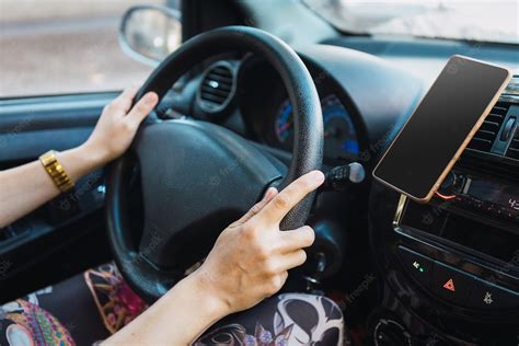 Free Photo | Selective focus shot of female's hands driving a car