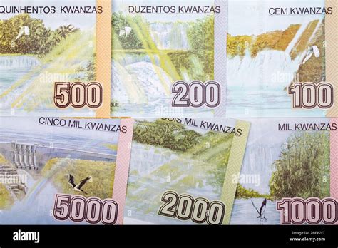 Currency of Angola - Kwanza a business background Stock Photo - Alamy