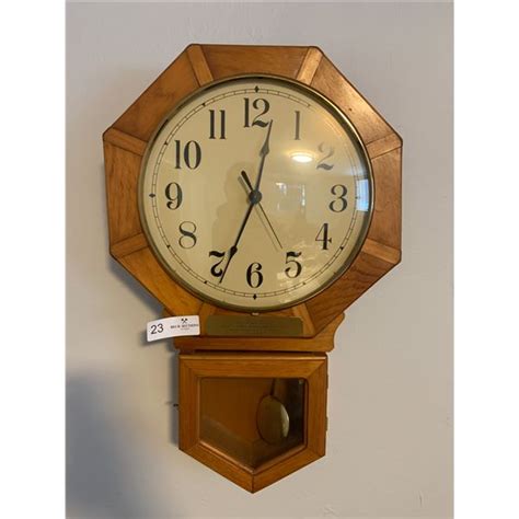 Wooden Pendulum Wall Clock - Beck Auctions Inc.