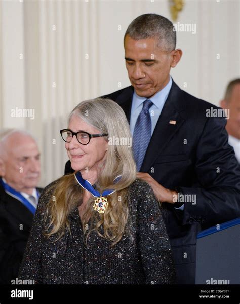 US President Barack Obama presents Margaret H. Hamilton with the ...