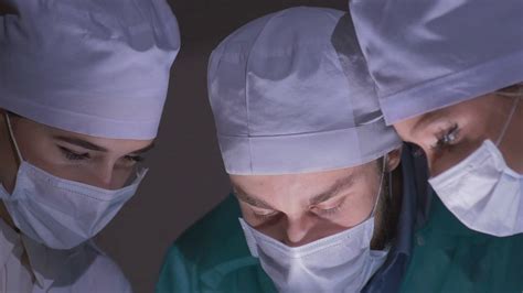 Doctors Surgeons Operate Patient In Stock Footage SBV-312759831 - Storyblocks