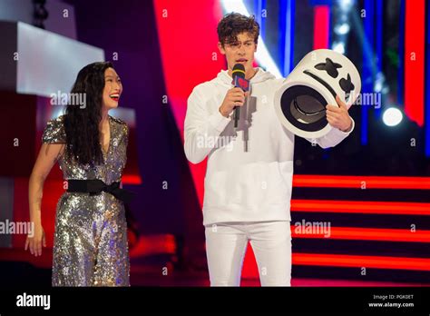 Toronto, Canada. 26th August 2018. Shawn Mendes reveals as Marshmello on stage during the 2018 ...