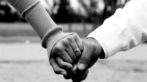 Black-Couple-Holding-Hands – N'DIGO