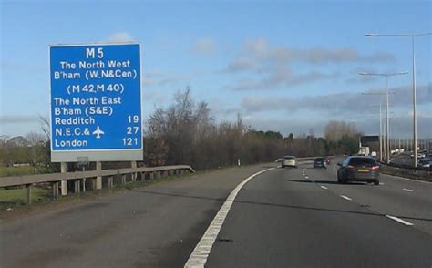 When a motorway sign tells you how many miles to London, where in London do they measure it to ...