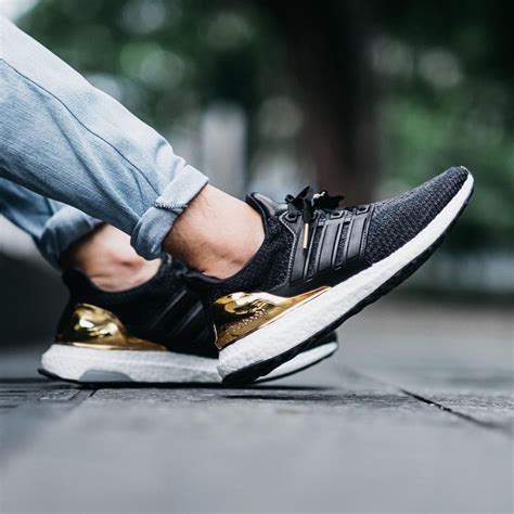 The long-awaited Black × Gold Adidas UltraBoost LTD. is finally here ...