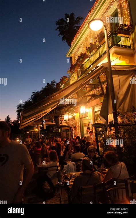 Restaurant terrace nightlife, Athens, Greece Stock Photo - Alamy