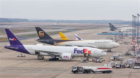 File:Fedex, Boeing 777F, N856FD and UPS, Boeing 747-400F, N574UP ...