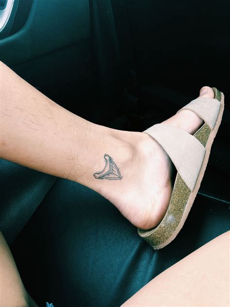 Shark Tooth Tattoo | Shark tooth tattoo, Tooth tattoo, Tattoos