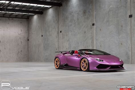 2 purple lamborghini huracan spyder gold rose pur wheels front side view - SSsupersports