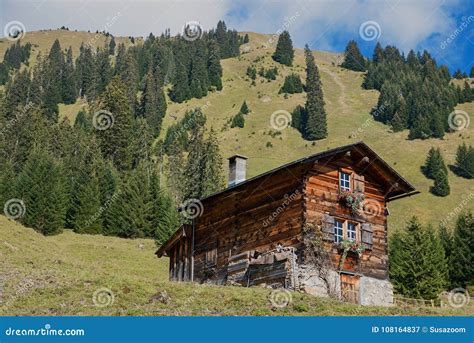 Small Wooden Cabin in the Swiss Alps Stock Image - Image of meadow, hill: 108164837