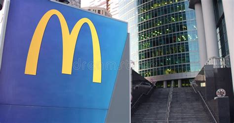 Street Signage Board with McDonald`s Logo. Modern Office Center ...