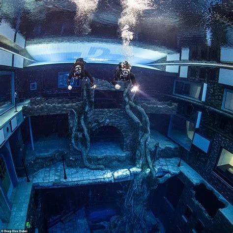 World's deepest pool opens in Dubai: 196ft-deep 'underwater city' includes 'abandoned' homes to ...