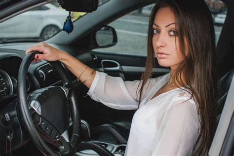 Beautiful girl driving car — Stock Photo © luckybusiness #11970301