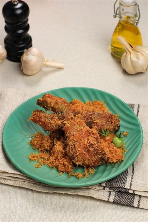 Ayam Serundeng, Indonesian Traditional Fried Chicken Recipe with Shredded Coconut Stock Photo ...