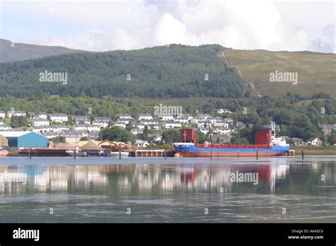 Corpach Scotland port dry cargo ship alongside harbour loading timber Stock Photo: 2367685 - Alamy