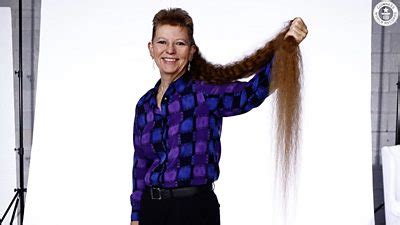 Woman sets record for world's longest mullet - BBC News