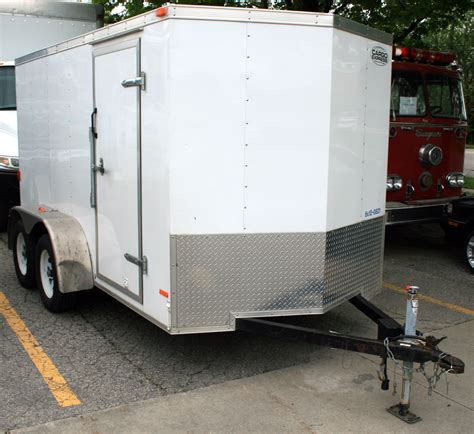 Left front view of our 6' x 12' enclosed cargo box utility trailer. - Iowa City, Cedar Rapids ...