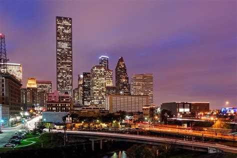 Downtown Houston Texas Skyline Beating Heart of a Bustling City Photograph by Silvio Ligutti ...