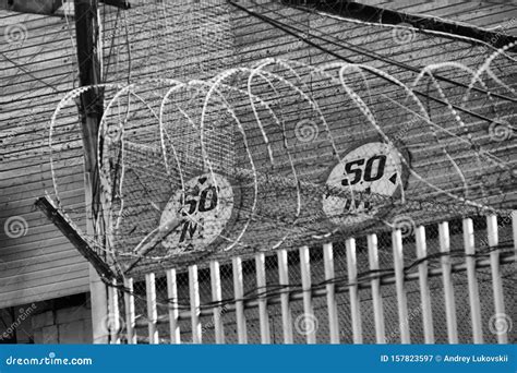 Prison Fence with Barbed Wire Stock Image - Image of imprisonment ...