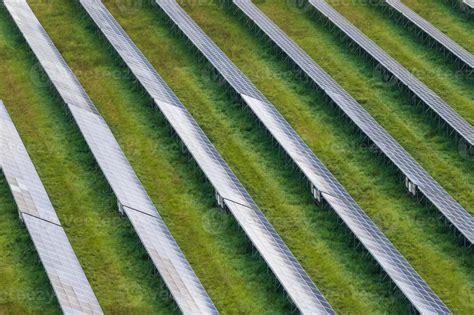 aerial view on farm field of solar panels. Renewable solar energy ...