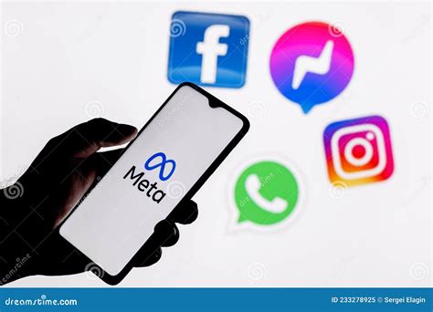 Facebook Changes Its Name To Meta. Smartphone with Meta Logo on the Background on Logos of ...