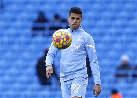 Man City defender Cancelo assaulted during robbery at home | Reuters