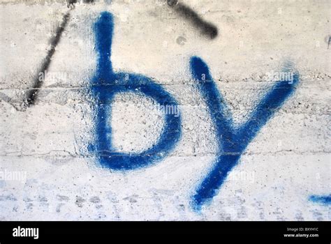 graffiti on the concrete wall written by Stock Photo - Alamy