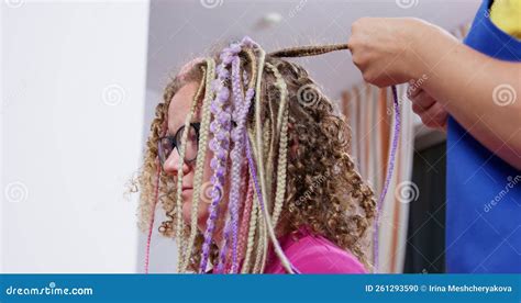 Woman Customer Undergoes Process of Removing Dreads in Salon Stock ...