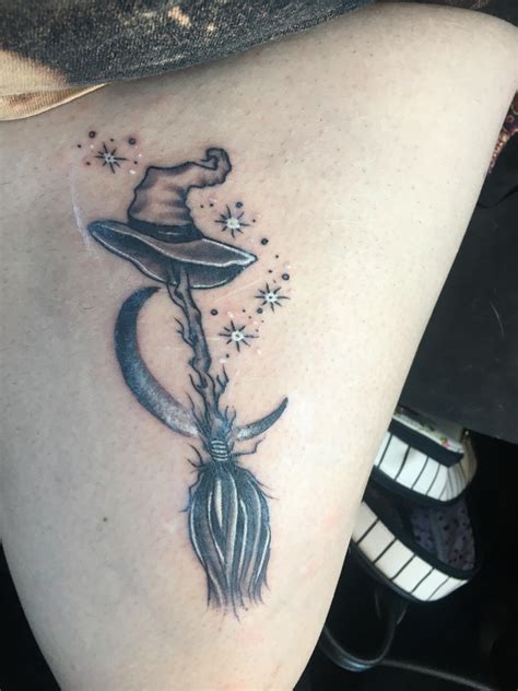 First tattoo! Witches broom stick with a crescent moon. Done by Jason ...