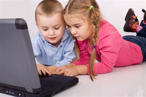 Kids Playing Computer Games Stock Image - Image of kids, people: 4259455