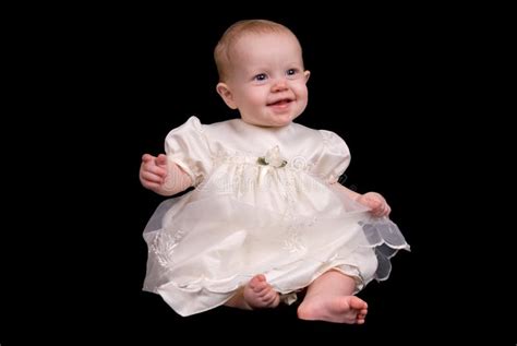 Baby girl in a white dress stock image. Image of soft - 3569579