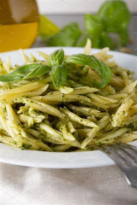 Traditional trofie pasta with pesto stock photo containing background ...