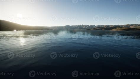 Beautiful calm lake with sunset 5764820 Stock Photo at Vecteezy