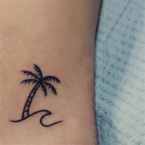 Minimalist Coconut Tree Tattoo Design - bmp-central