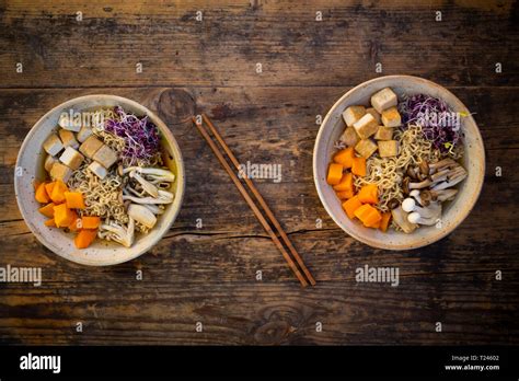 Miso Ramen soup with noodles, red radish sprouts, pumpkin, fried tofu ...