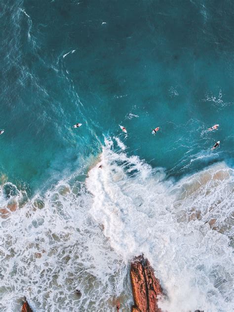 Aerial view of ocean waves photo – Free Blue Image on Unsplash