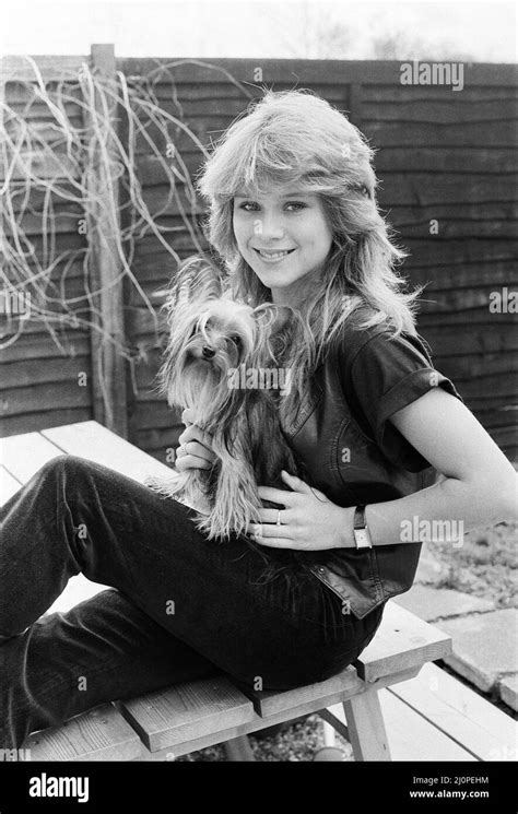 Samantha Fox contestant Miss Sunday People competition, aged 16 years old, pictured with pet dog ...