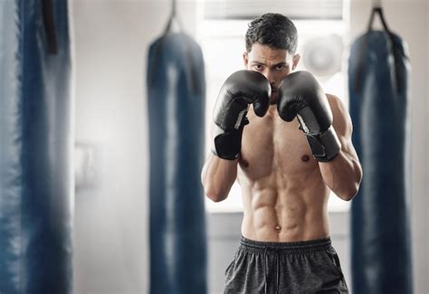 Premium Photo | Boxer cardio and man training with boxing gloves for ...