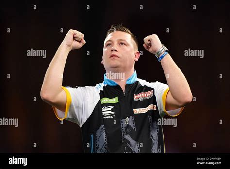 Chris Dobey celebrates after beating Michael Smith (not pictured) on ...