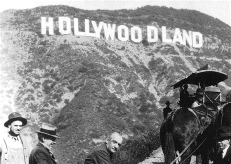 Workers in front of the recently completed Hollywoodland sign, 1923 ...