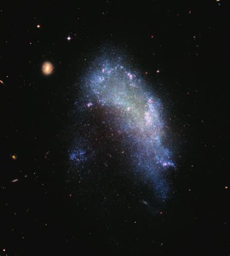 NGC 1427A, a dwarf galaxy in the Fornax cluster. Photo: NASA, ESA, and ...