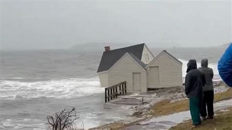 Historic South Portland fish shacks washed away by high tide at Willard Beach