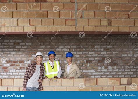 Construction Team at Building Site Stock Photo - Image of building ...