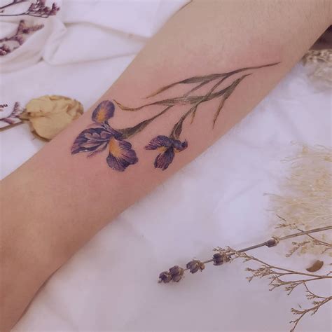 Discover 66+ small iris tattoo latest - in.coedo.com.vn
