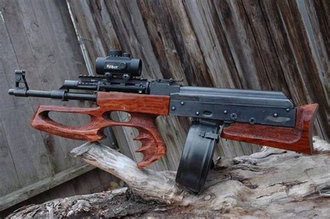 A Bullpup style AK47 with creative hardwood furniture, all while remaining completely practical ...