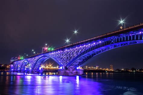 The Peace Bridge and Buffalo Skyline at night Photograph by Jay Smith