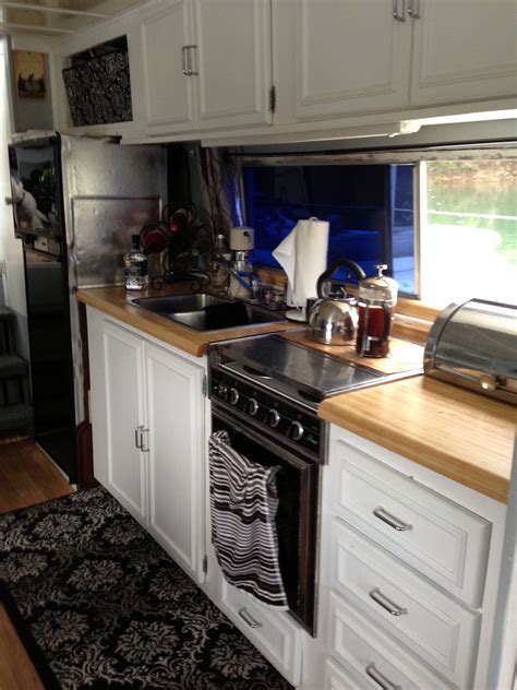 Our tiny kitchen on the lake! | Houseboat kitchen, Tiny kitchen, Houseboat living